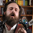 Iron And Wine's Sam Beam performs a Tiny Desk Concert at the NPR Music offices. Iron And Wine's Sam Beam performs a Tiny Desk Concert at the NPR Music offices.