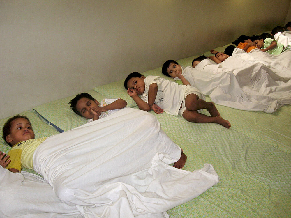 Toddlers take a rest at one of the Edhi Foundation's orphanages in Karachi.