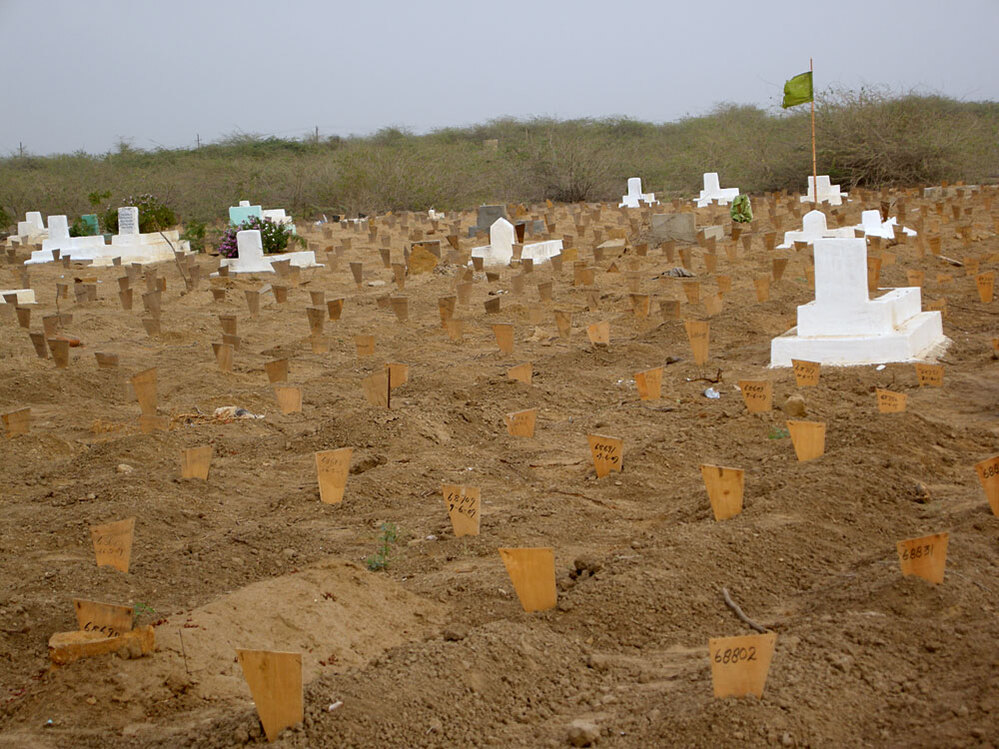 Numbered but unnamed graves in the vast cemetery where the oundation buries Karachi's forgotten dead