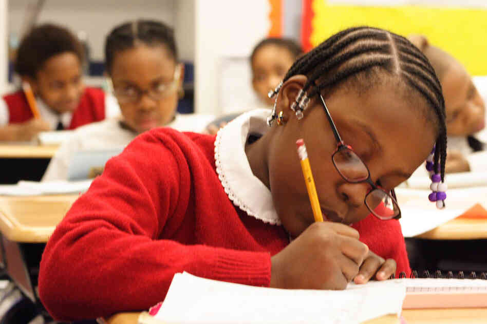 Girl works on an assignment