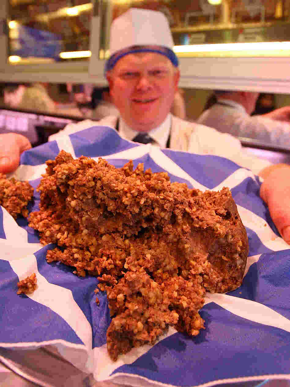 Butcher Robert Patrick, seen with his award-winning haggis, rejects the idea that haggis is English.