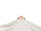 A person underneath a sheet. iStockphoto.com A person underneath a sheet. iStockphoto.com