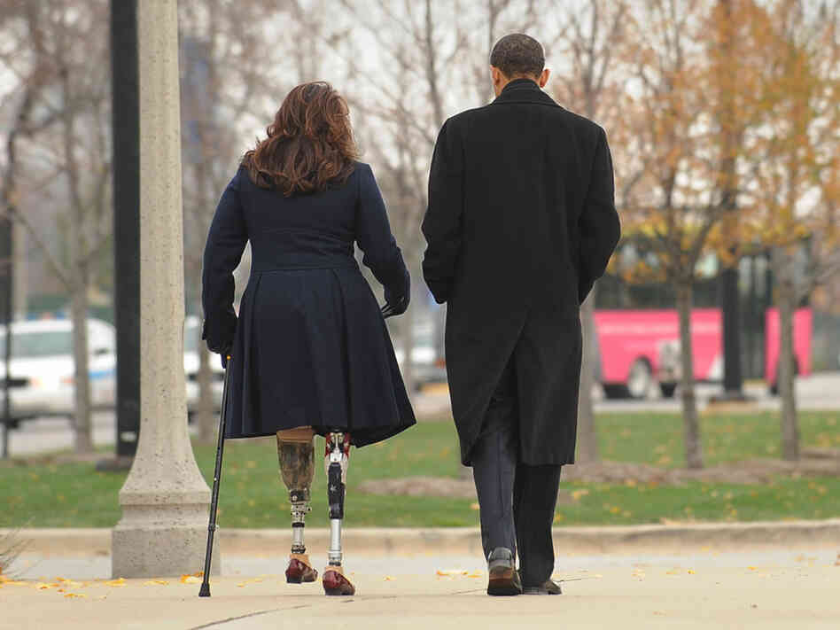 Then President-elect Barack Obama walks with veteran Tammy Duckworth on Veterans Day, 2008. Then President-elect Barack Obama walks with veteran Tammy Duckworth on Veterans Day, 2008.
