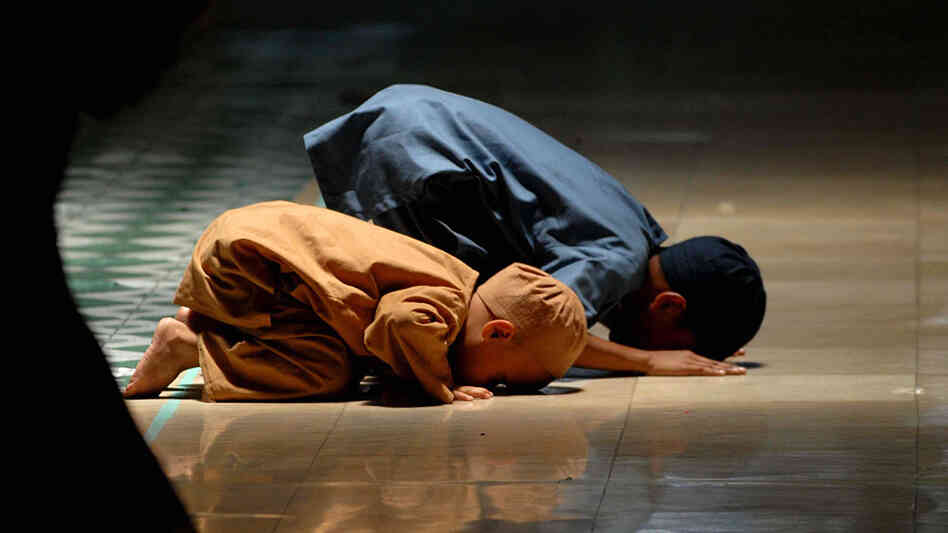 Muslim children pray at a mosque during the holy month of Ramadan.