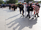 An honor guard carries the casket of Sen. Edward Kennedy An honor guard carries the casket of Sen. Edward Kennedy
