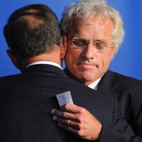 Joseph P. Kennedy, the senator's nephew, is embraced at the service.