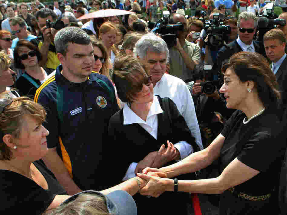 Victoria Kennedy, widow of Sen. Edward Kennedy, greets  people standing in line.