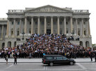 Mourners stand on the steps of the U.S. Capitol Mourners stand on the steps of the U.S. Capitol