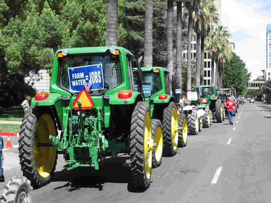 As the Sacramento rally was starting, a line of John Deere tractors paraded through downtown