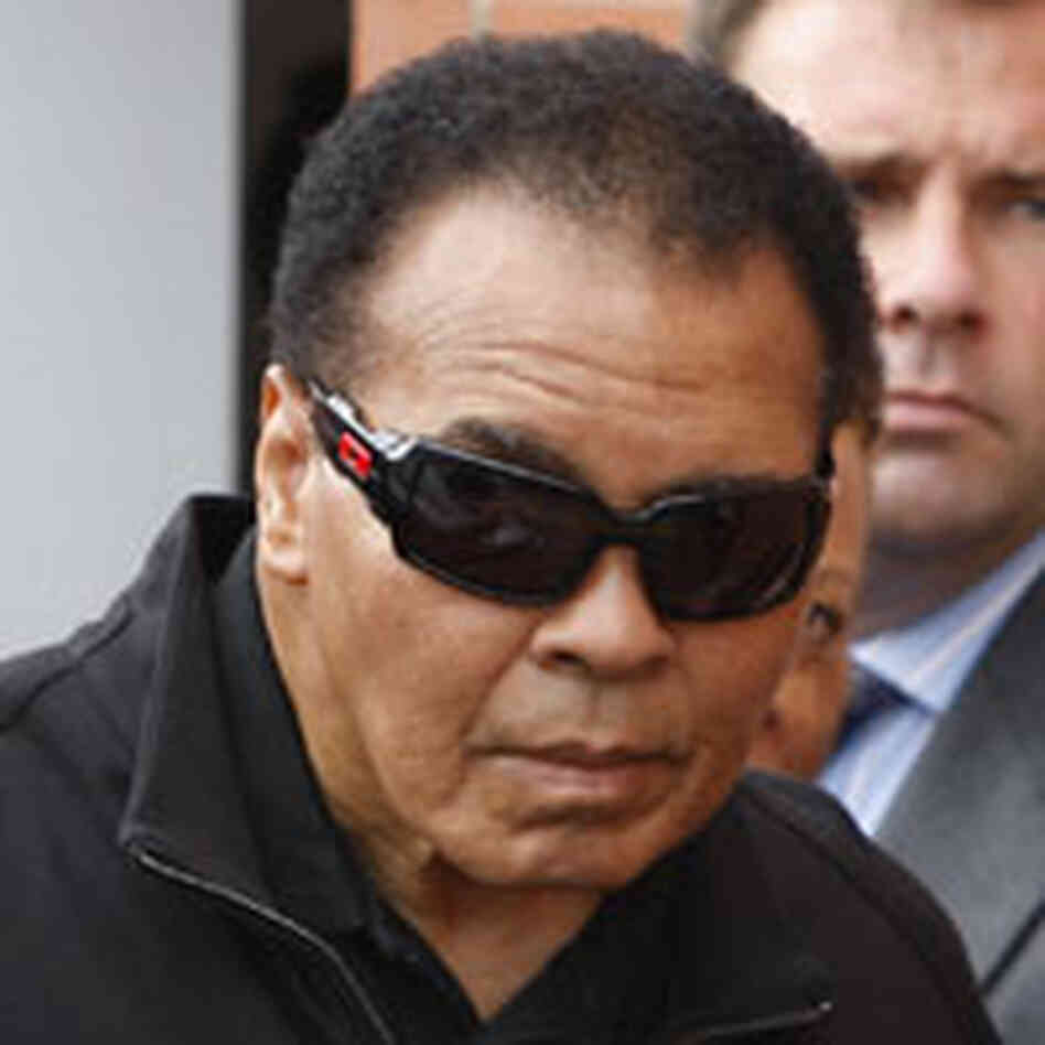 Boxing great Muhammad Ali, centre, is seen arriving for a visit to boxer Ricky Hatton's gym. Boxing great Muhammad Ali, centre, is seen arriving for a visit to boxer Ricky Hatton's gym.