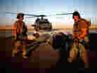 Pararescue Jumpers transport a policeman.
