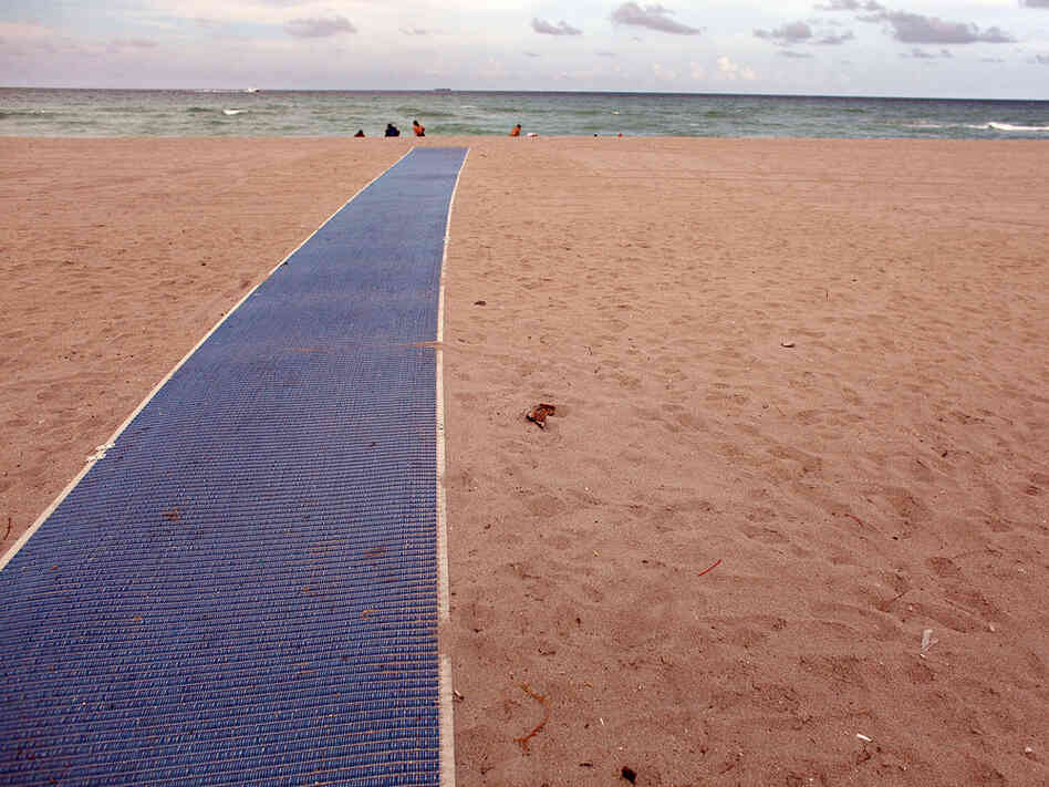 A nearly empty beach in Hollywood, Fla.  Joe Raedle/Getty Images