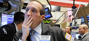 James Denaro works on the floor of the New York Stock Exchange, Oct. 10, 2008.  Credit: Richard Drew/AP