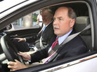 GM's CEO Fritz Henderson driving with Tom Stephens, vice president of product development GM's CEO Fritz Henderson driving with Tom Stephens, vice president of product development
