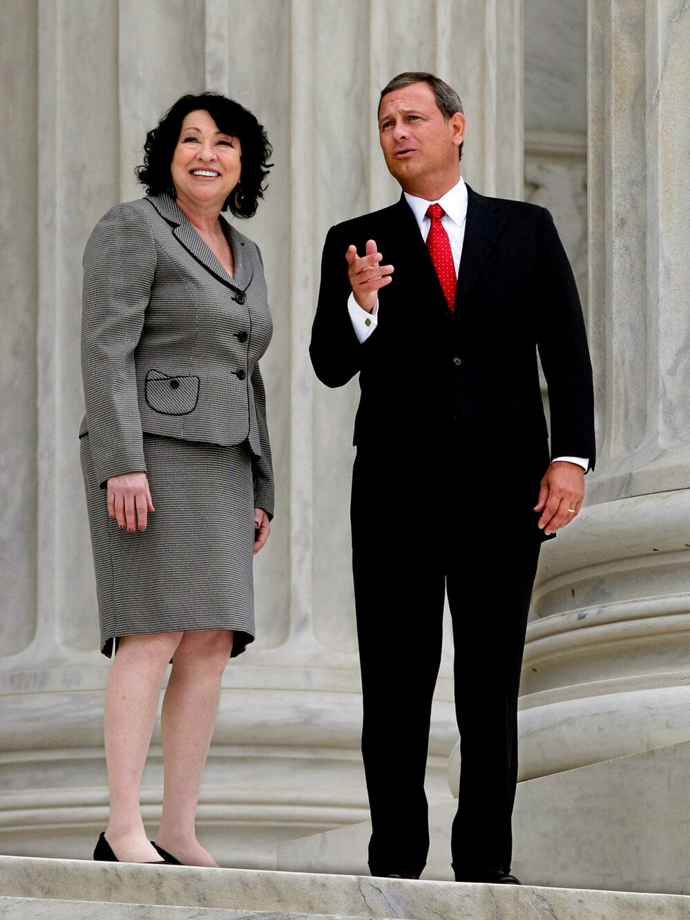 Sotomayor escorted by Chief Justice John Roberts