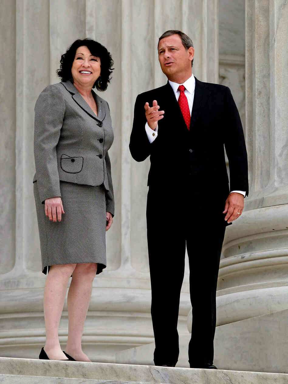 Sotomayor escorted by Chief Justice John Roberts