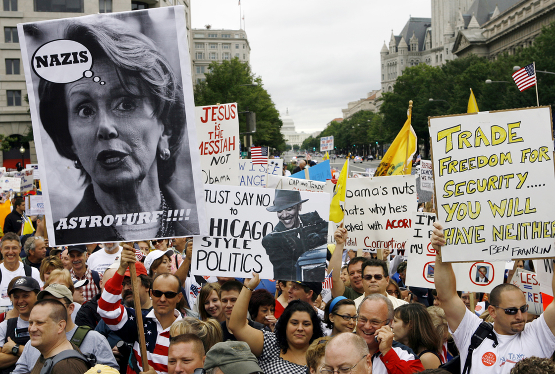 Protesters rally at Freedom Plaza in Washington Saturday. Jose Luis Magana/AP