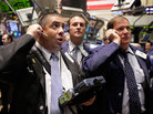 Traders gather at the post that handles Sprint Traders gather at the post that handles Sprint