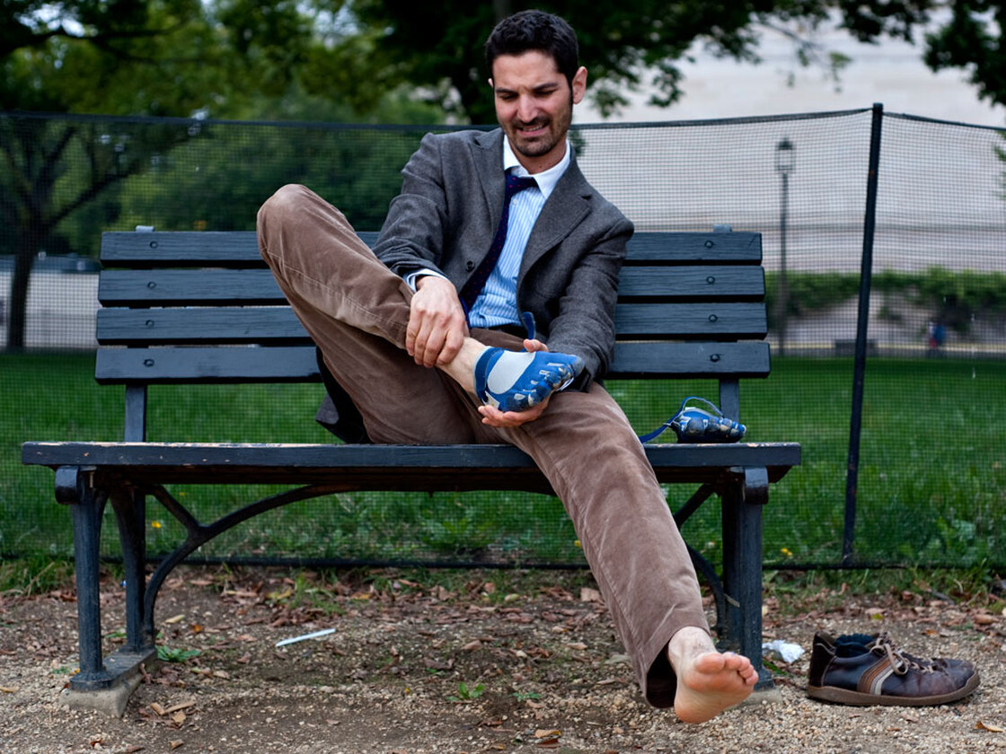 Host Guy Raz takes the shoes off after a test run. Ryan Gibbons/NPR