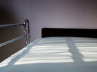 An empty hospital bed. An empty hospital bed.