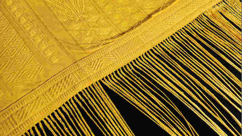 Tapestry made from the silk strands of golden orb spiders Tapestry made from the silk strands of golden orb spiders