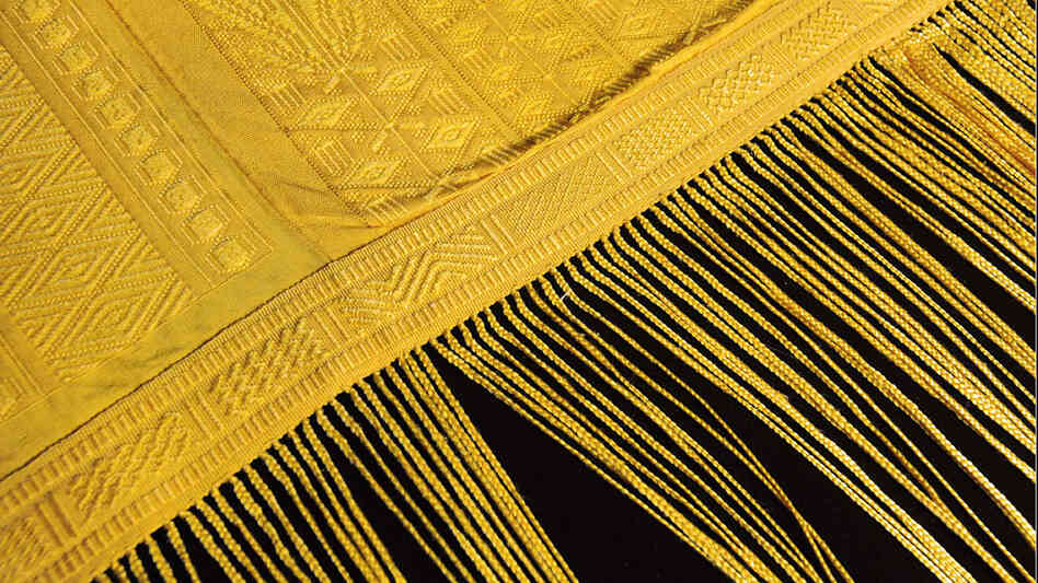 Tapestry made from the silk strands of golden orb spiders Tapestry made from the silk strands of golden orb spiders
