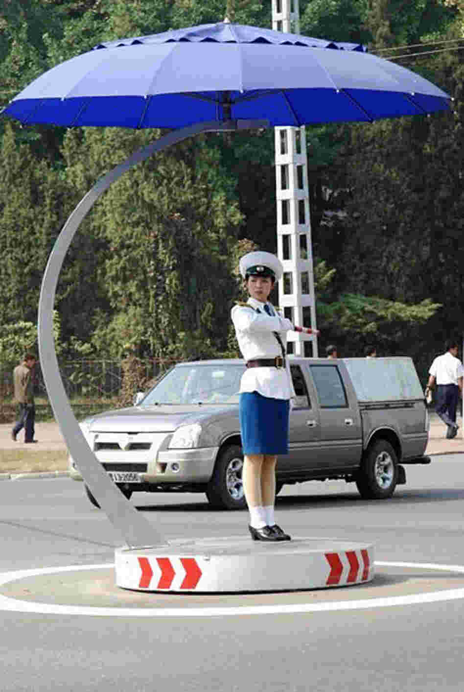 Women, not lights, control traffic in Pyongyang