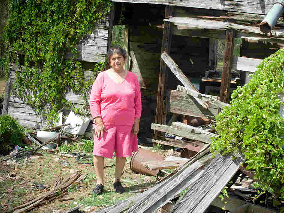 Modesta Salazar in front of the family farm