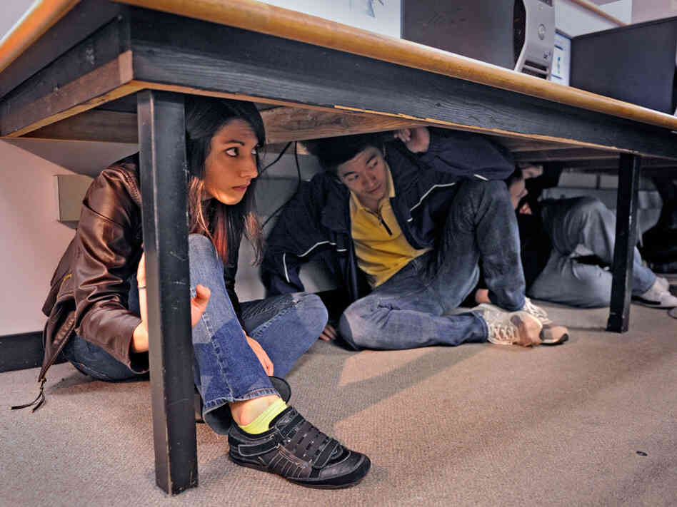 Academy of Art University students Lisa Allen, left, and Shaofu Zhang, right, take part in the Calif