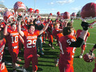 Smith Center celebrates after defeating Olpe High School during the Kansas state championships. Smith Center celebrates after defeating Olpe High School during the Kansas state championships.