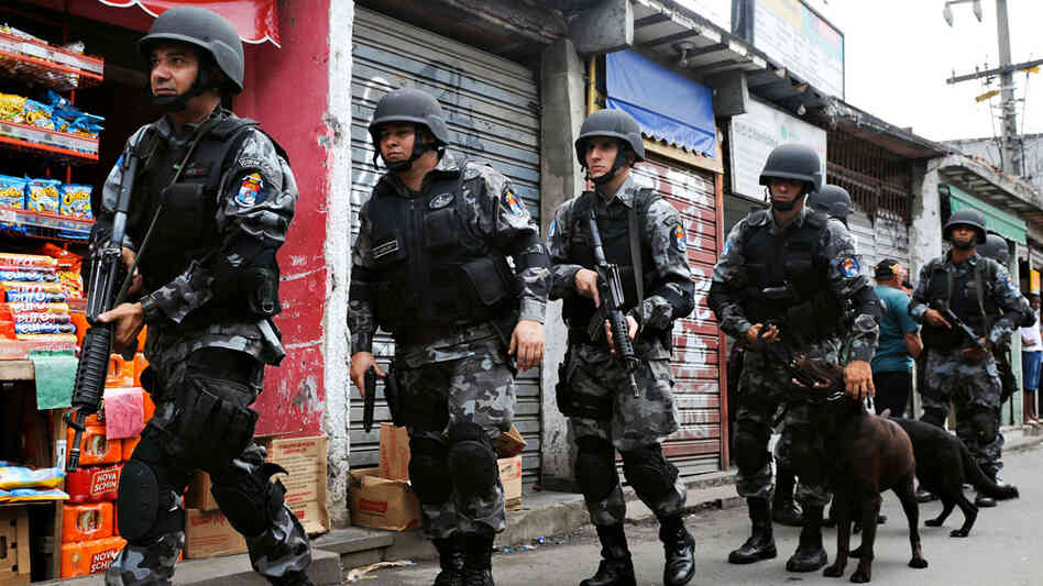 WIDE: Police patrol the Jacarezinho slum in Rio de Janeiro.