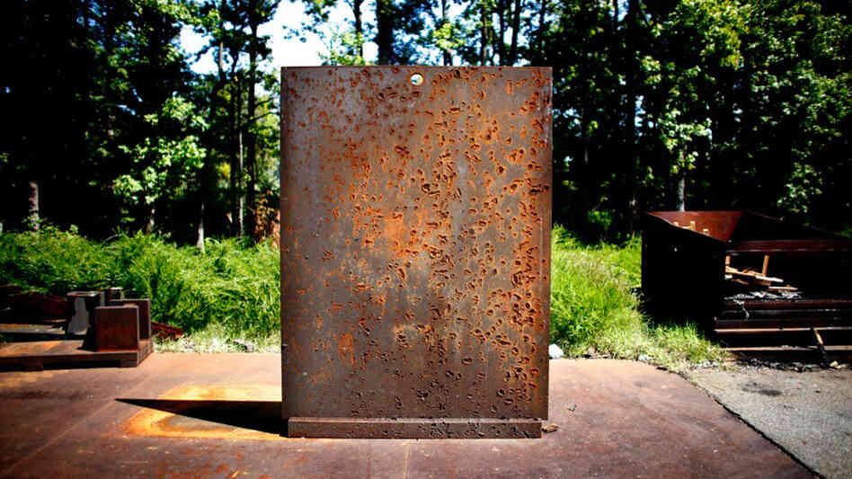 A scarred blast wall on the Aberdeen Proving Ground A scarred blast wall on the Aberdeen Proving Ground