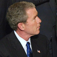 President Bush signs the Patriot Act into law.