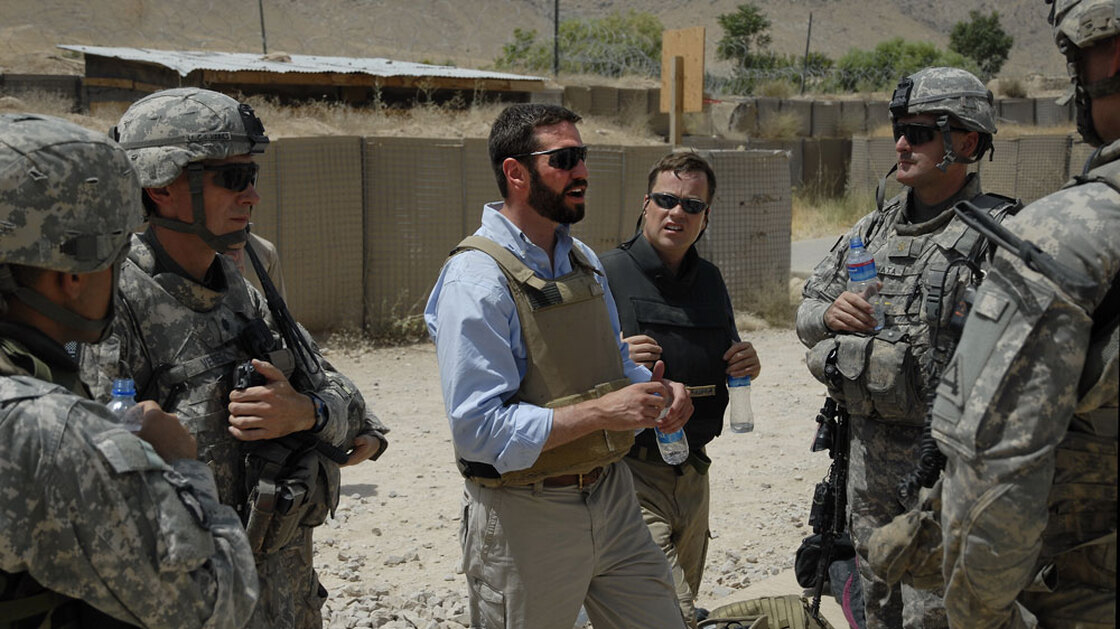 Matthew Hoh speaks with soldiers and airmen in Afghanistan.