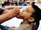 A 5-year-old boy receives the H1N1 flu nasal mist. A 5-year-old boy receives the H1N1 flu nasal mist.