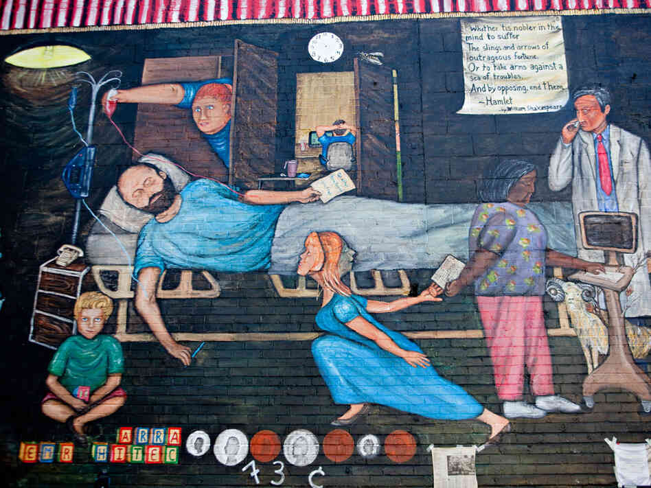 A detail of Regina Holliday's mural depicting her husband, Fred, in his hospital bed.