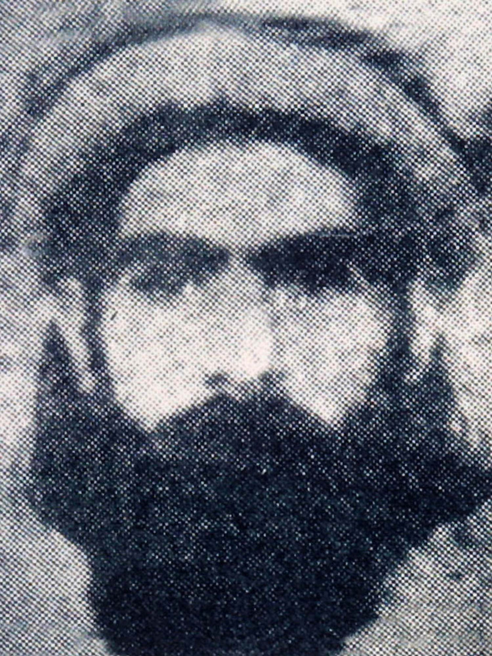 The rarely photographed Taliban leader Mullah Omar is reportedly seen in this undated photo.