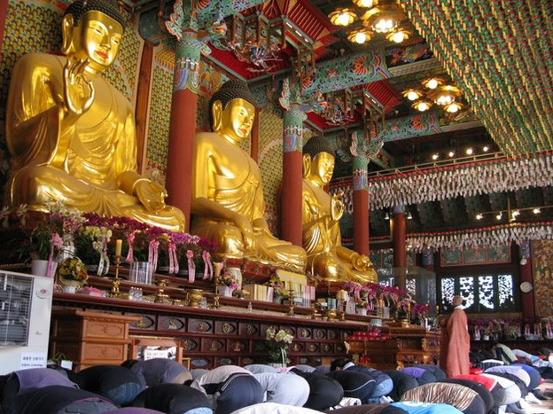 South Korean parents pray for high scores at Jogyesa, the largest Buddhist temple in Seoul.