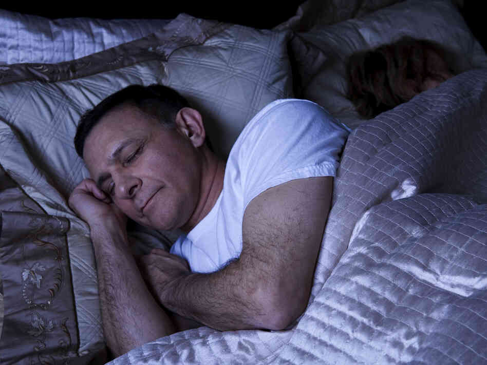 A man sleeps.
