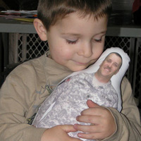 Zack Halander watches his father leave for his second deployment.