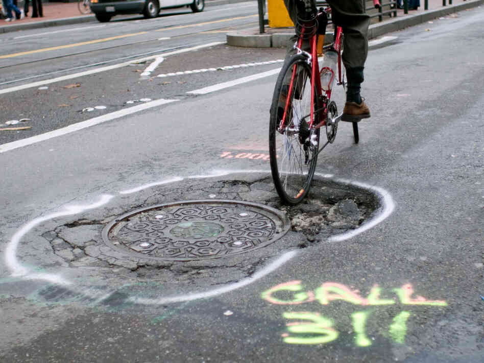 Frank Chan at San Francisco's 1,000th pothole