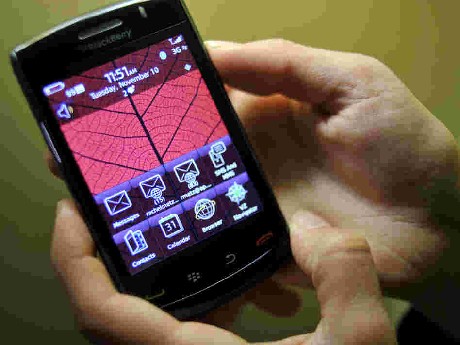 A person handles the new BlackBerry Storm2