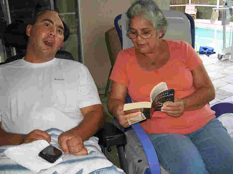 Nellie Bagley reads to her son, Jose, who was wounded in Iraq.