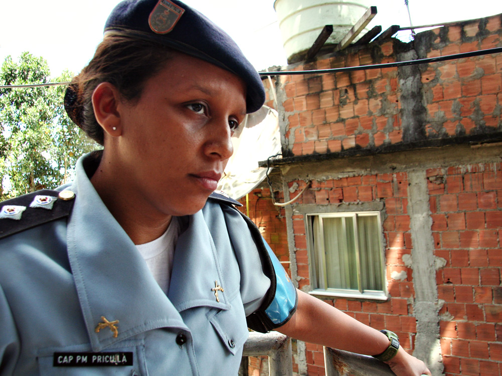 Police Capt. Pricilla Azevedo is the commander of a new community policing unit in Rio de Janeiro. The first of its kind, the new unit approaches relations in <em>favelas</em> such as Santa Marta from the ground up — preferring communication with local residents as opposed to past police tactics of armed confrontation.