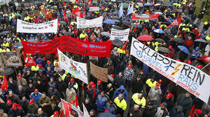 Daimler employees in Germany protesting the proposed move of some production to the U.S. Daimler employees in Germany protesting the proposed move of some production to the U.S.