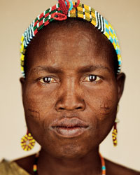 Portrait of Samay, a Hadza hunter-gatherer in Tanzania, by Martin Schoeller