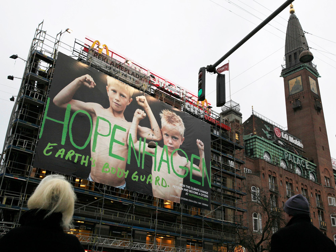 A poster in Copenhagen reads "Hopenhagen Earth Body Guard"