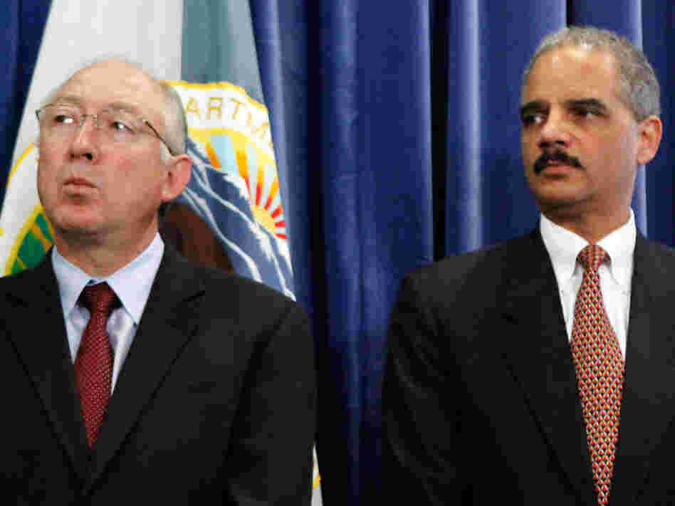 Attorney General Eric Holder (right) and Interior Department Secretary Ken Salazar