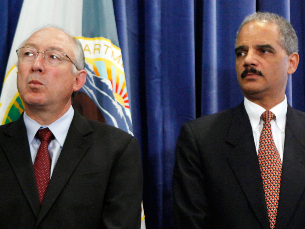 Attorney General Eric Holder (right) and Interior Department Secretary Ken Salazar announce a proposed settlement Tuesday of a lawsuit alleging American Indians' trust accounts were mismanaged by the Interior Department.
