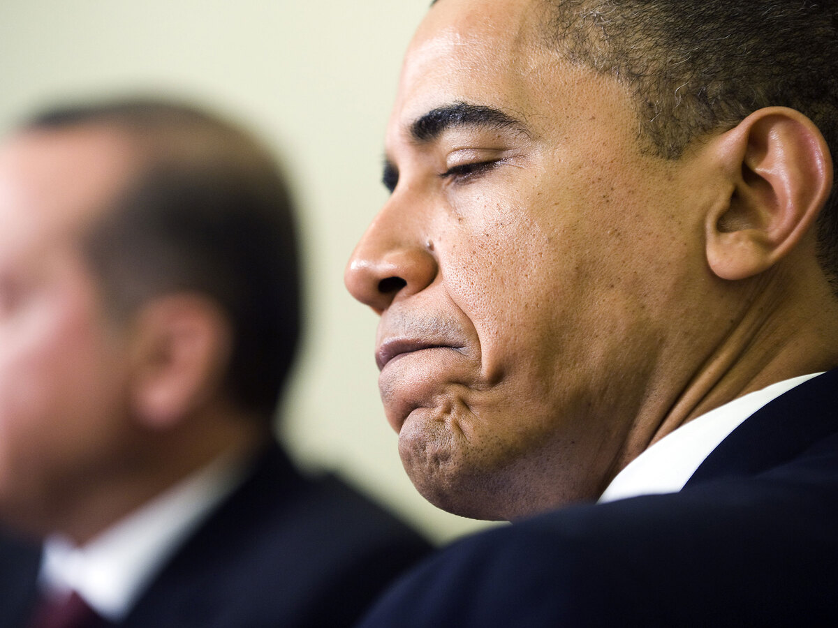President Barack Obama, frowning